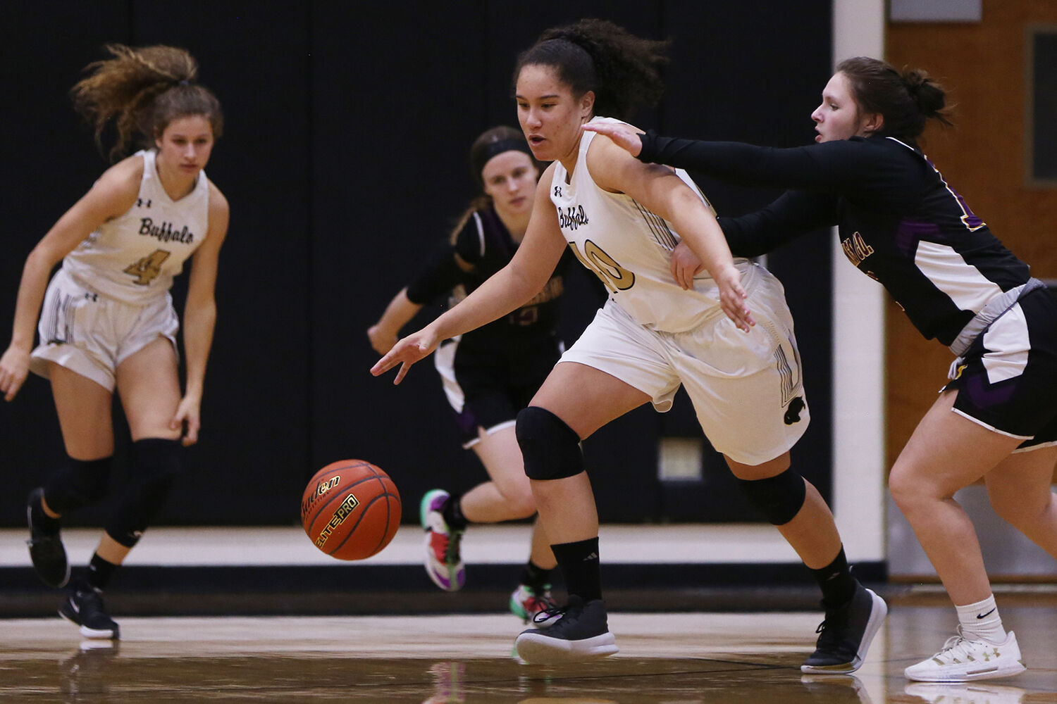 Danica Boyce dribbles down court